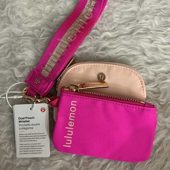 lululemon athletica Handbags - lululemon athletica Vibrant Pink and Soft Cream Wristlet